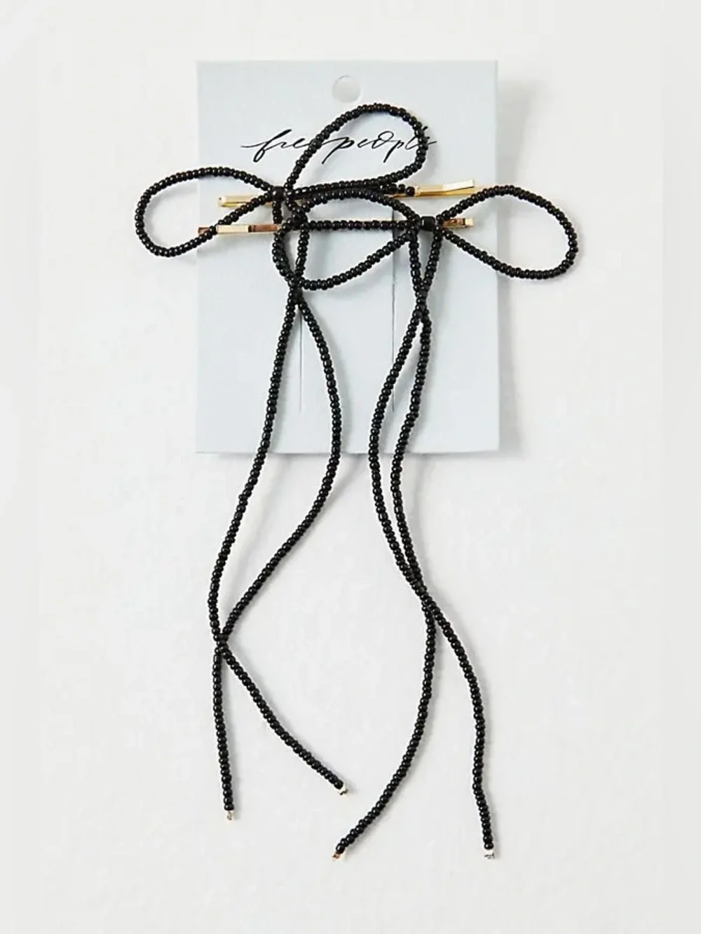 Free People beaded bow pin